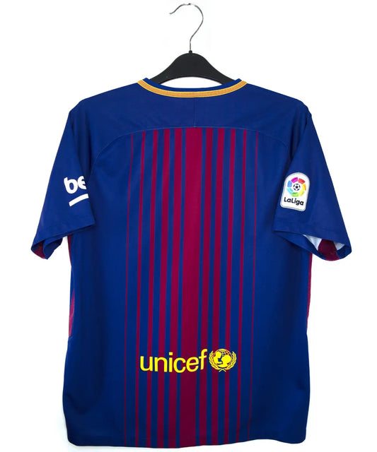 Maillot vintage domicile bleu et rouge du fc barcelone de la saison 2017-2018. On peut retrouver l'équipementier nike et le sponsor rakuten