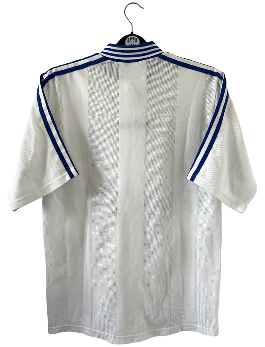 Maillot de foot vintage domicile blanc de l'AJ Auxerre saison 19976/1997. On peut retrouver l'équipementier Adidas et le sponsor Fimagest. Il s'agit d'un maillot authentique d'époque.