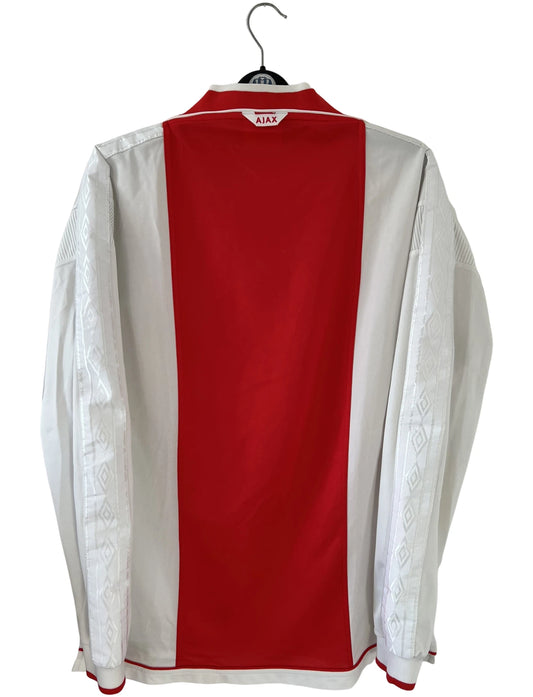 Maillot de foot vintage domicile rouge et blanc de l'Ajax Amsterdam saison 1999/2000. On peut retrouver l'équipementier Umbro et le sponsor ABN-AMRO. Il s'agit d'un maillot authentique d'époque issu du stock pro.