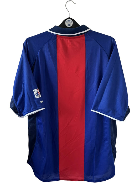 Maillot de foot vintage domicile du PSG de la saison 2000/2001. On peut retrouver l'équipementier Nike et le sponsor Opel. Il s'agit d'un maillot authentique d'époque.