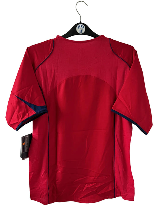 Maillot de foot vintage extérieur rouge du PSG de la saison 2004/2005. On peut retrouver l'équipementier Nike et le sponsor Thomson. Il s'agit d'un maillot authentique d'époque.
