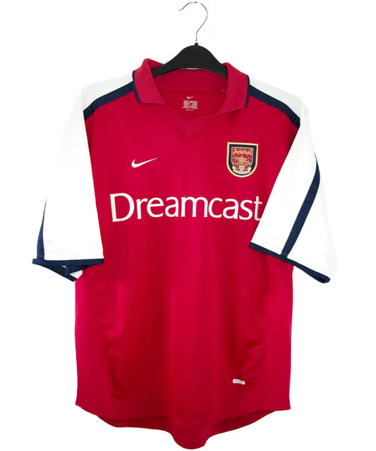 Maillot vintage domicile rouge et blanc d'arsenal de la saison 2000-2002. On peut retrouver l'équipementier nike et le sponsor dreamcast