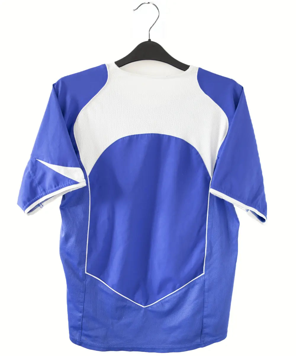 Maillot vintage bleu et blanc domicile du bresil de la saison 2004-2006. On peut retrouver l'équipementier nike