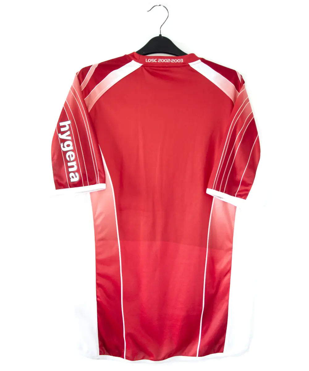 Maillot domicile du losc de la saison 2002-2003 de couleur rouge et blanche. On peut retrouver l'équipementier kipsta et le sponsor ing direct