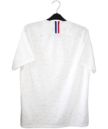 Maillot vintage extérieur de l'équipe de france 2018 de couleur blanc. On peut retrouver l'équipementier nike