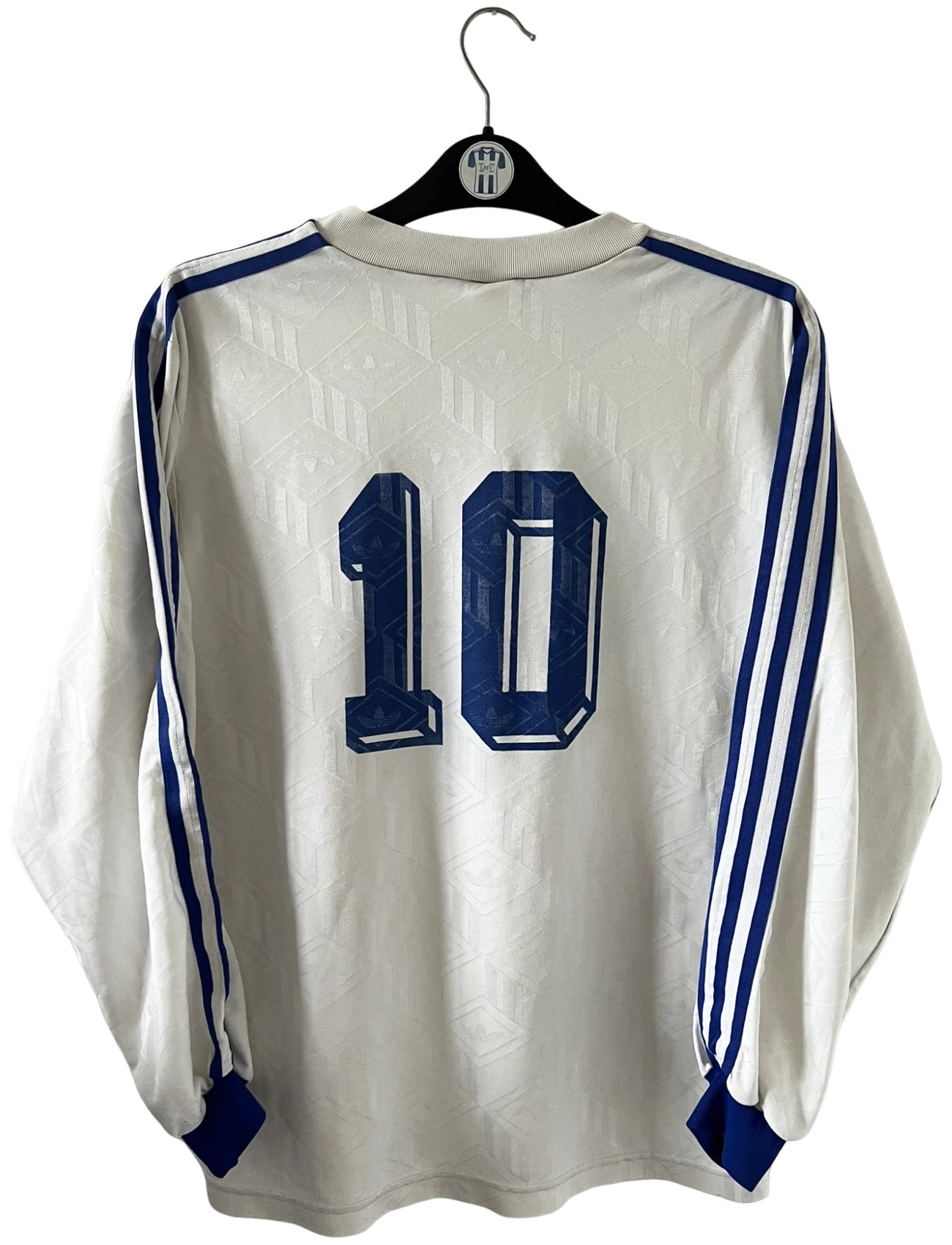 Maillot de foot vintage domicile blanc de l'Amiens SC 1989/1990. On peut retrouver l'équipementier Adidas et le sponsor Amiens Sud. Il s'agit d'un maillot authentique d'époque.