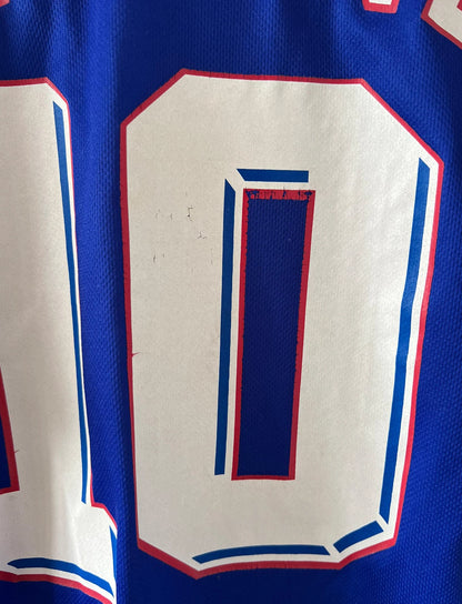 Maillot foot vintage domicile equipe de france 1998 bleu blanc et rouge. On peut retrouver l'équipementier adidas. Ils 'agit d'un maillot authentique d'époque floqué Zinedine Zidane