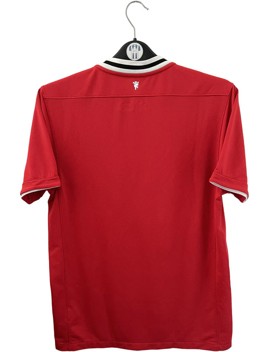 Maillot de foot vintage domicile rouge de Manchester United 2011/2012. On peut retrouver l'équipementier Nike et le sponsor Aon. Il s'agit d'un maillot authentique d'époque.