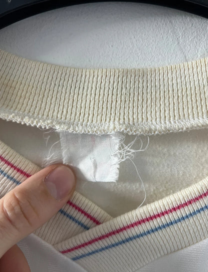 Maillot foot vintage domicile blanc de l'OM 1989/1991. On peut retrouver l'équipementier Adidas et le sponsor Panasonic. Il s'agit d'un maillot authentique d'époque.