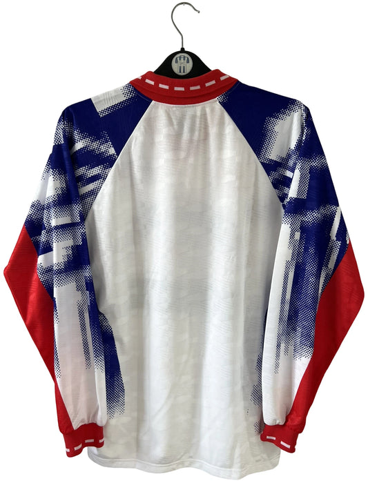 Maillot de foot vintage domicile blanc du PSG de la saison 1992/1993. On peut retrouver l'équipementier Nike et les sponsors Commoore et Tourtel. Il s'agit d'un maillot authentique d'époque.