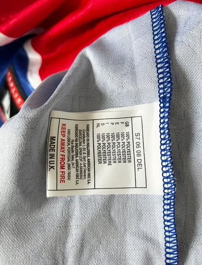 Maillot de foot vintage domicile bleu et rouge du PSG 1996/1997. On peut retrouver l'équipementier Nike et le sponsor OPEL. Il s'agit d'un maillot authentique d'époque.