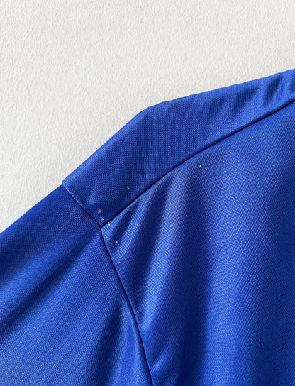 Maillot de foot vintage domicile du PSG 1999/2000. On peut retrouver l'équipementier Nike et le sponsor Opel. Il s'agit d'un maillot authentique d'époque.