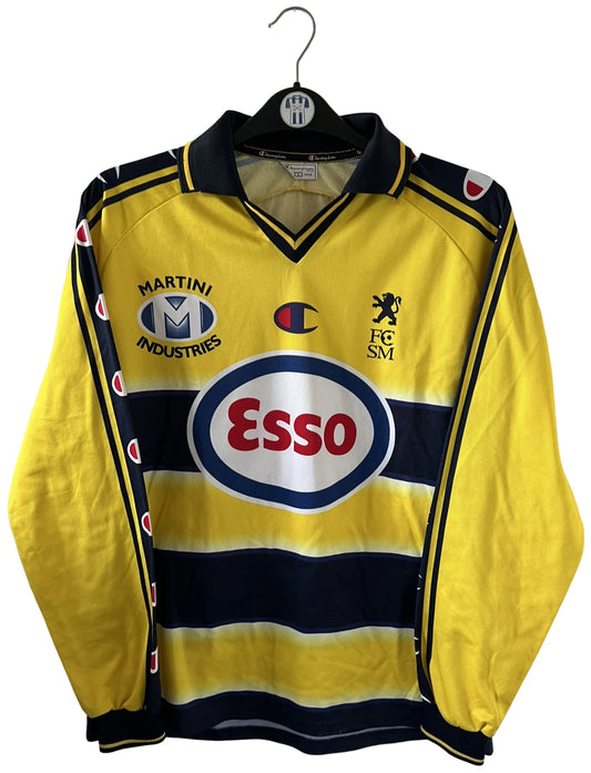 Maillot de foot vintage domicile jaune du FC Sochaux-Montbliard, de la saison 2002/2004. On peut retrouver l'équipementier Champion et le sponsor Esso. Il s'agit d'un maillot authentique d'époque.
