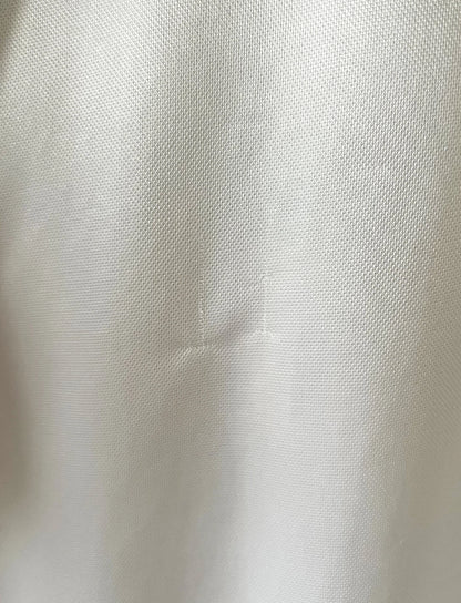 Maillot de foot vintage extérieur blanc et violet de Toulouse saison 1994/1995. On peut retrouver l'équipementier Asics et le sponsor Champion. Il s'agit d'un maillot authentique d'époque.