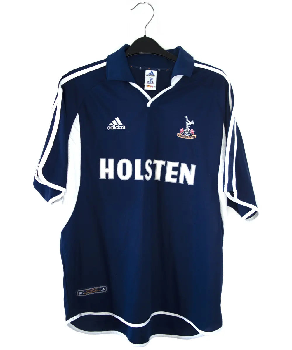 Maillot domicile de Tottenham bleu et blanc de la saison 2000-2001. On peut retrouver l'équipementier adidas et le sponsor holsten