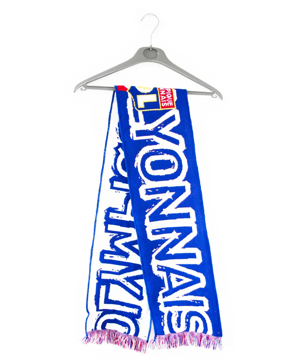 Echarpe de l'olympique lyonnais édité lors des années 2000. L'écharpe est de couleur bleu, rouge et blanc