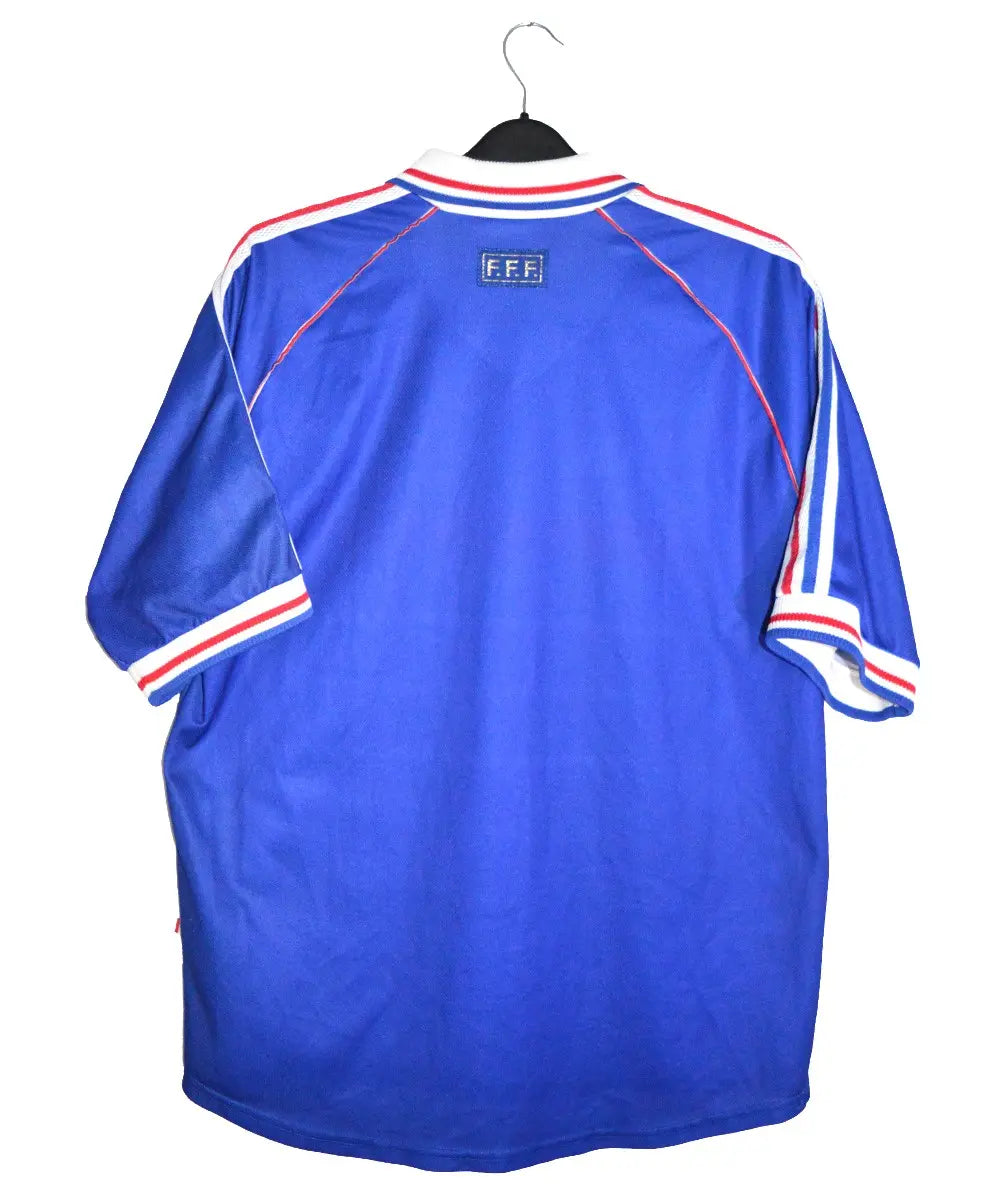 Maillot de foot retro/vintage authentique domicile de l'équipe de france 1998. De couleur bleu et rouge, on peut retrouver l'équipementier adidas.