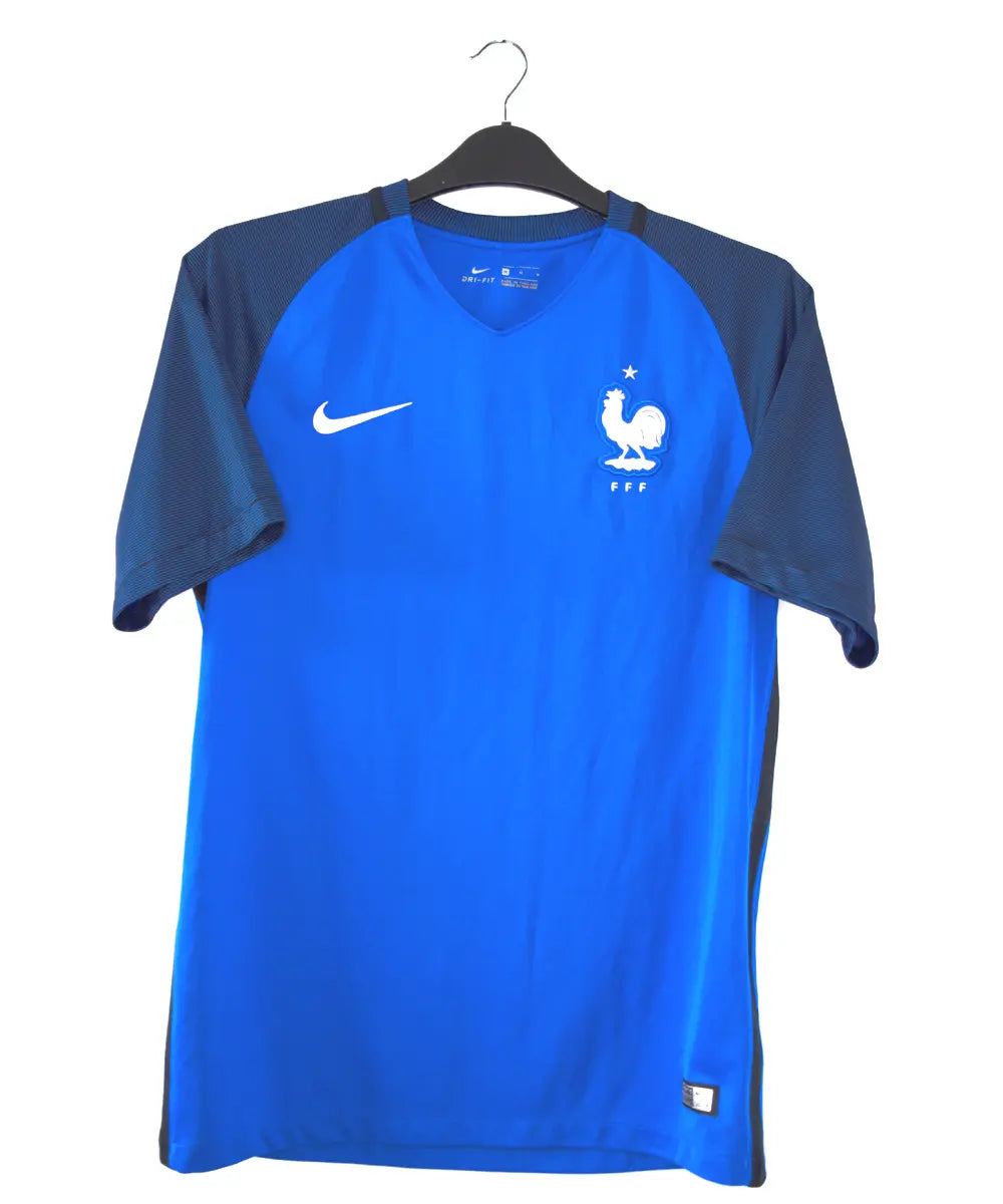 Maillot domicile de l'équipe de france porté lors de l'euro 2016. Le maillot est de couleur bleu, on peut retrouver l'équipementier nike