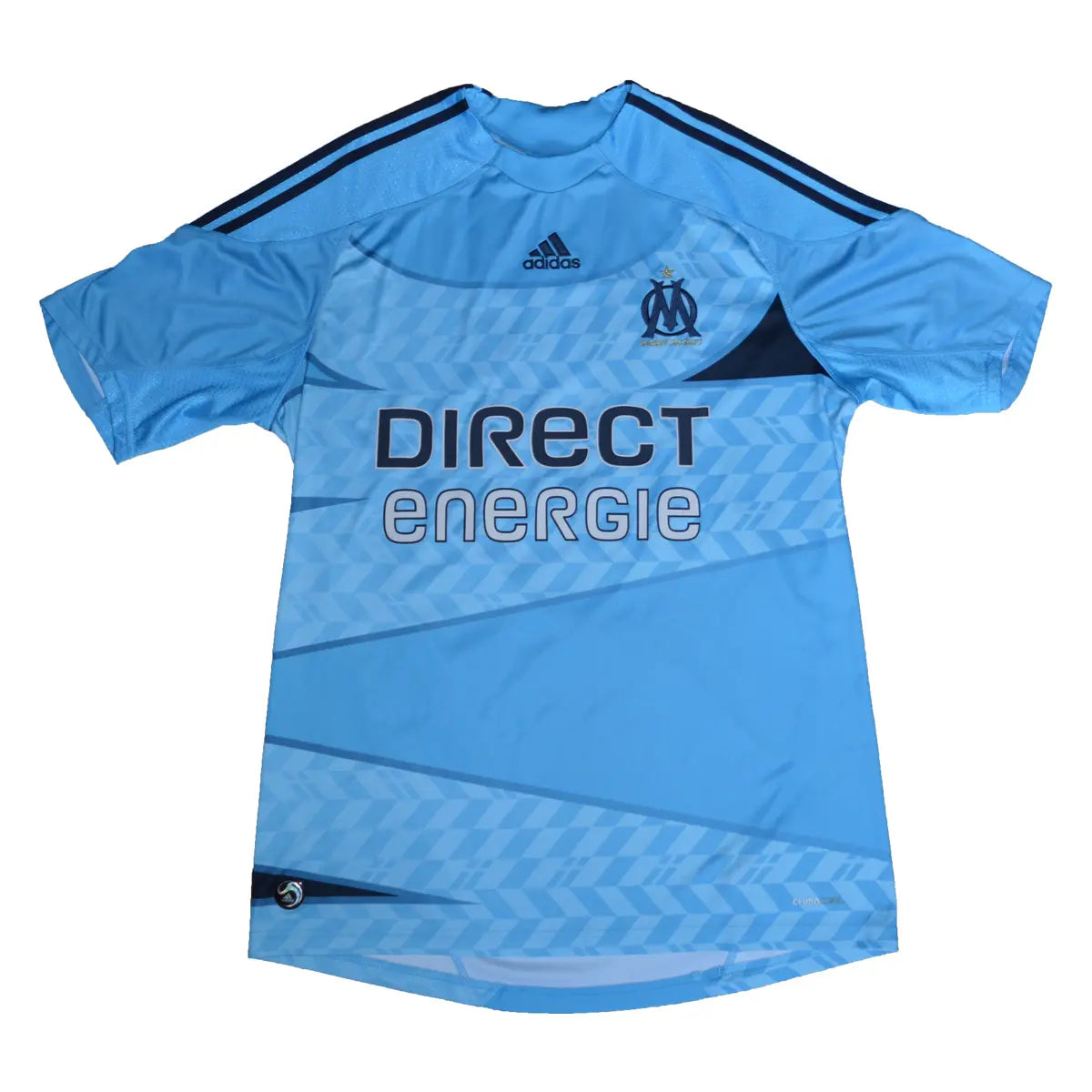 Maillot retro/vintage authentique extérieur de l'om 2009-2010 bleu, avec le sponsor direct énergie, et floqué mamadou niang de face